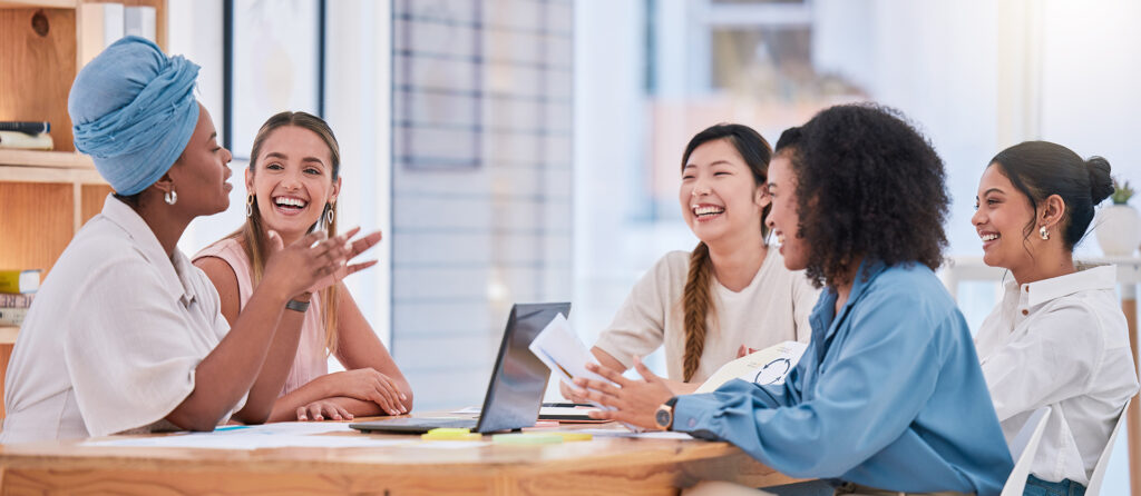 Group of women talking at a table